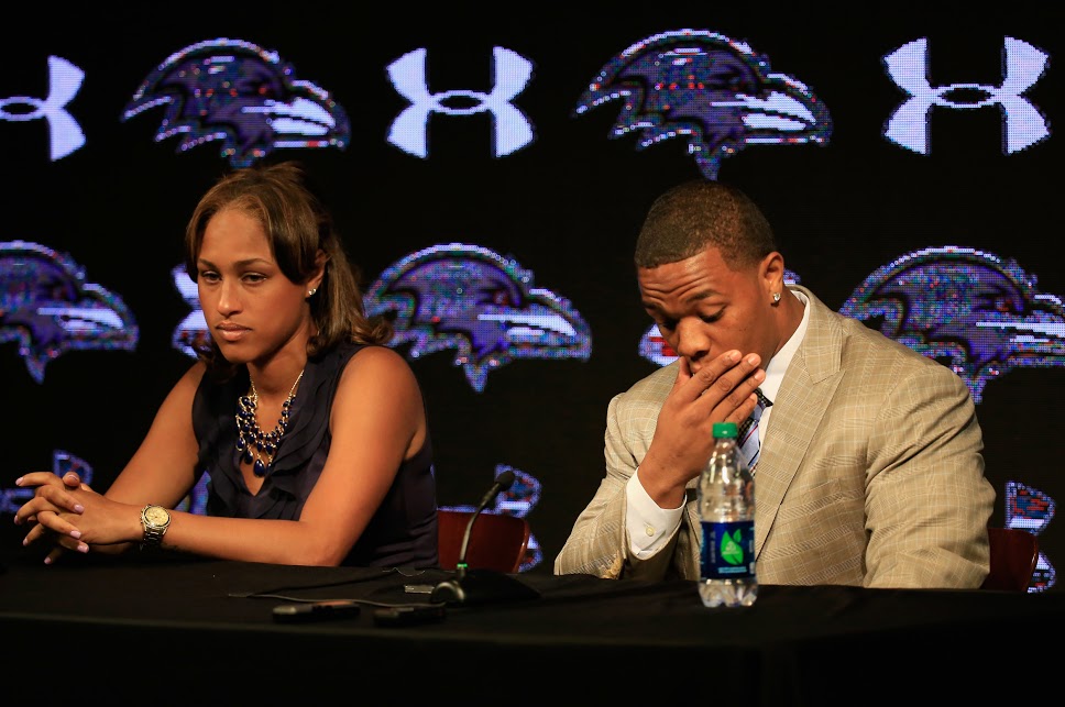 Ray Rice with his wife at a press conference