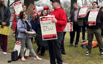 The Queens College PSC chapter holds a protest.