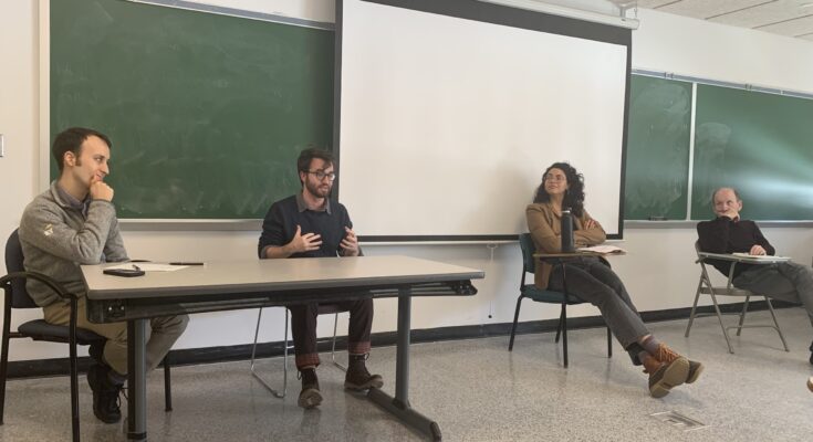 A classroom with guest speakers.