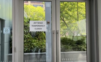 sign on door says the jay walk is temporarily closed