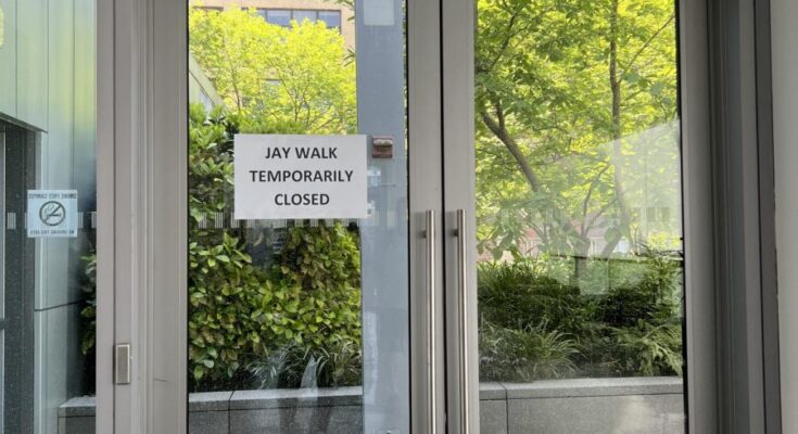 sign on door says the jay walk is temporarily closed