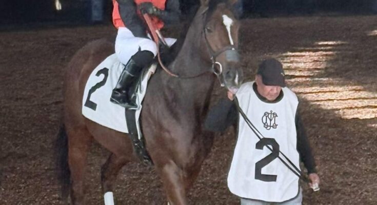 Jockey Forest Boyce and groom Jose after John Jay’s October race at Laurel Park.
